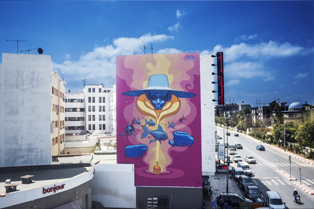 Normal, Graphiste et illustrateur de formation, Abid Ayoub alias Normal est un graffeur marocain originaire d’Agadir. Diplômé de...